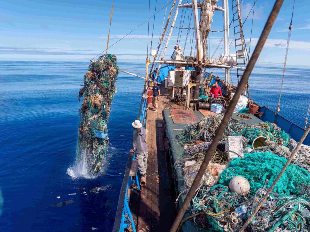 Hawaii team hauling nets on board from the Great Pacific Garbage Patch